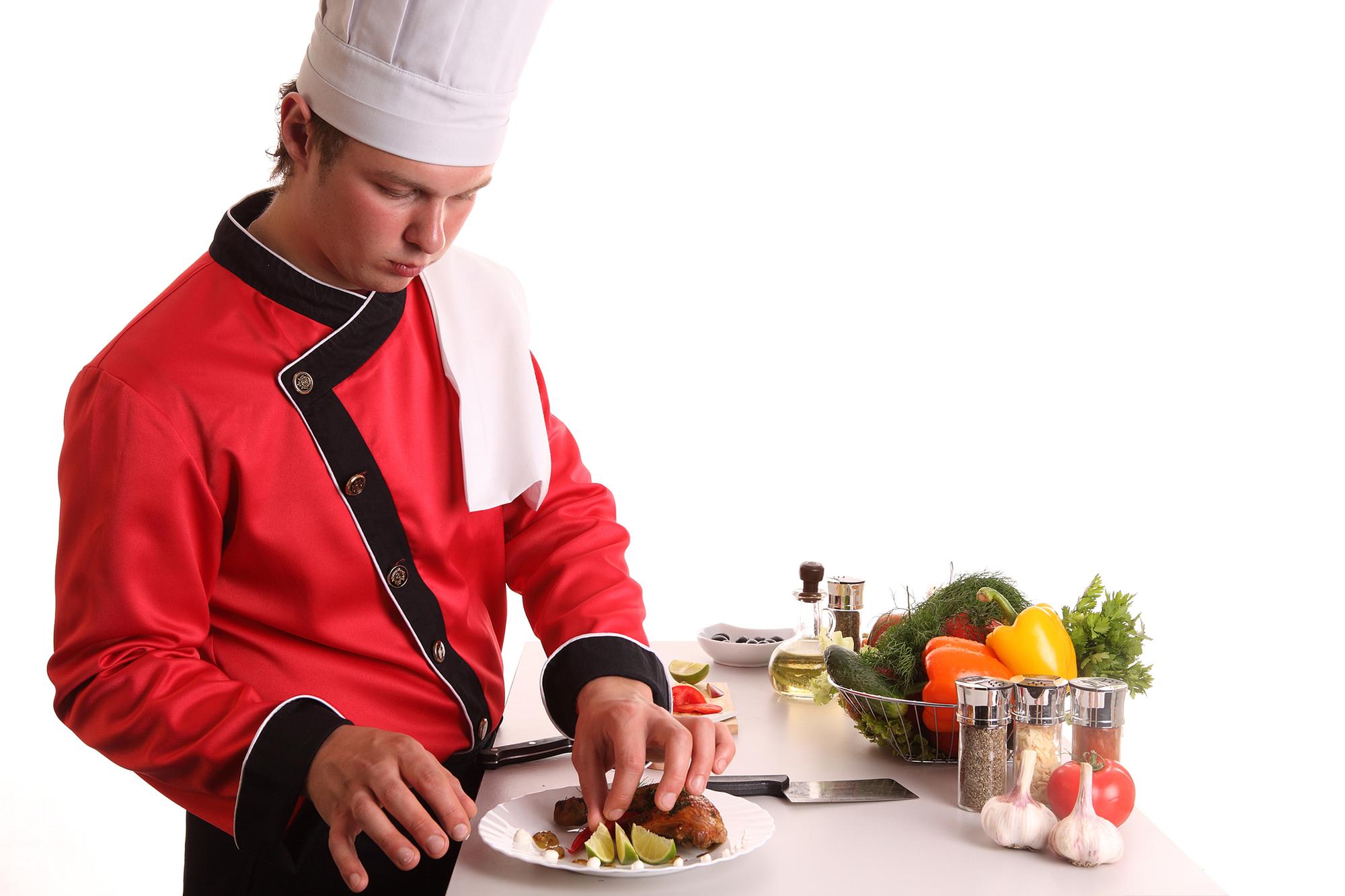 Student plating a dish