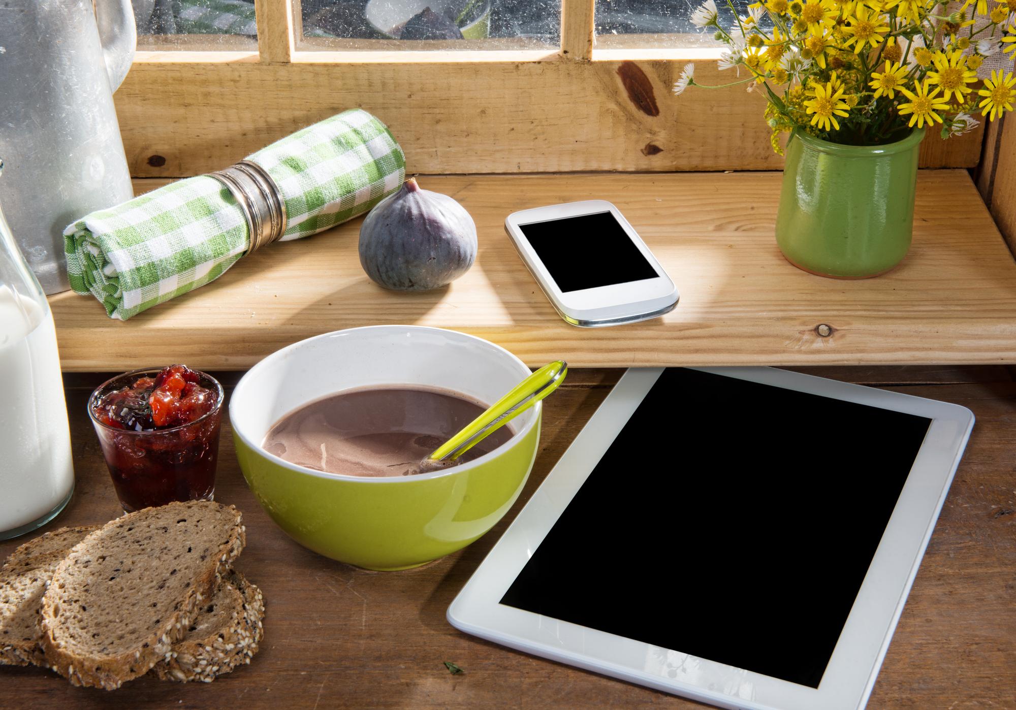 Flat lay of course materials and tablet